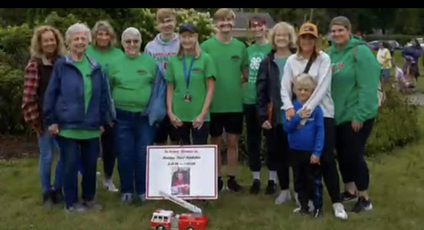 Kim Quick and her family, of Oglesby, walk in the Memory Walk in Peru in memory of her son, Nathan.