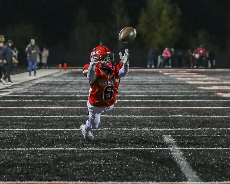 Bolingbrook's Caleb Wallace (6) has a catch fall out of his reach during football game between Yorkville at Bolingbrook Friday, Oct 24, 2025 in Bolingbrook.