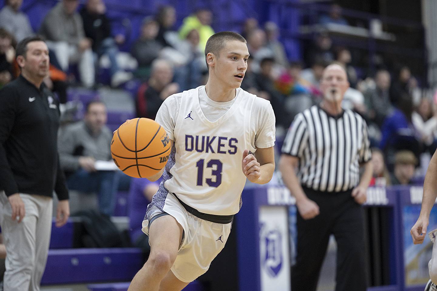 Dixon’s Cullen Shaner drives to the hoop against Rochelle Monday, Dec. 9, 2024, at Dixon High School.