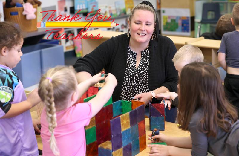 Laurel Copeland, Little Spartans Early Learning Program teacher at South Prairie Elementary School, works with students Wednesday, April 6, 2023, at the school in Sycamore.