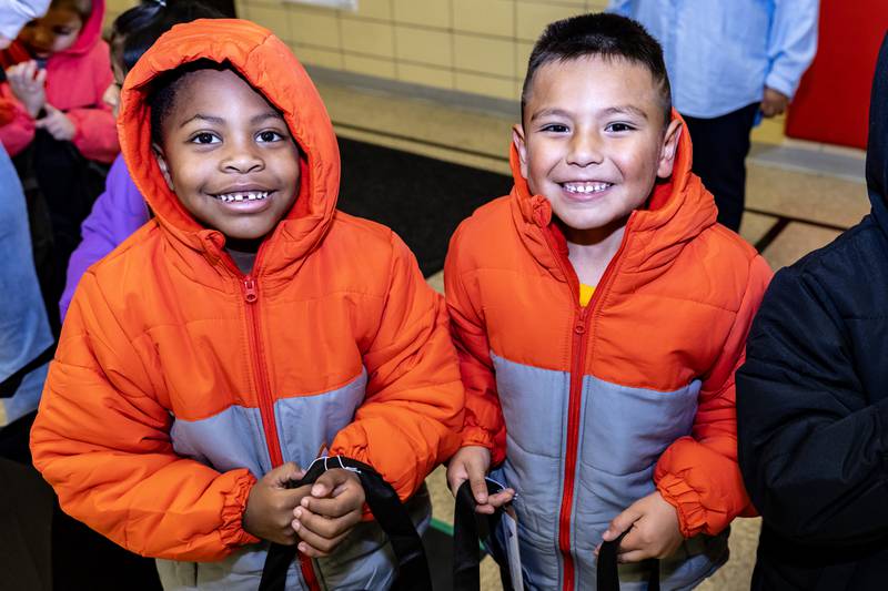 Kamryn Caldwell and Leo Torres love their twin coats from Nicor Gas, in collaboration with Operation Warm, at T. E. Culbertson Elementary School on Nov. 7, 2025.