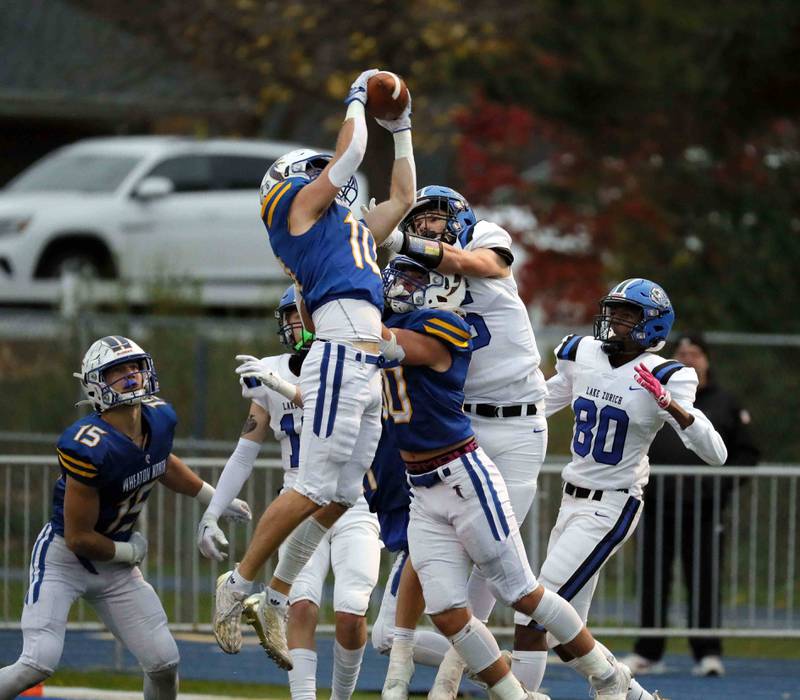 Brian Hill/bhill@dailyherald.com
Wheaton North's Tyler O'connor (10) pulls in an interception against Lake Zurich during the second round of the IHSA playoffs Saturday November 5, 2022 in Wheaton.