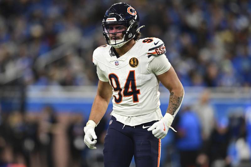 Chicago Bears defensive end Austin Booker lines up during the first half of an NFL football game against the Detroit Lions in Detroit, Thursday, Nov. 28, 2024. The Lions won 23-20. (AP Photo/David Dermer)