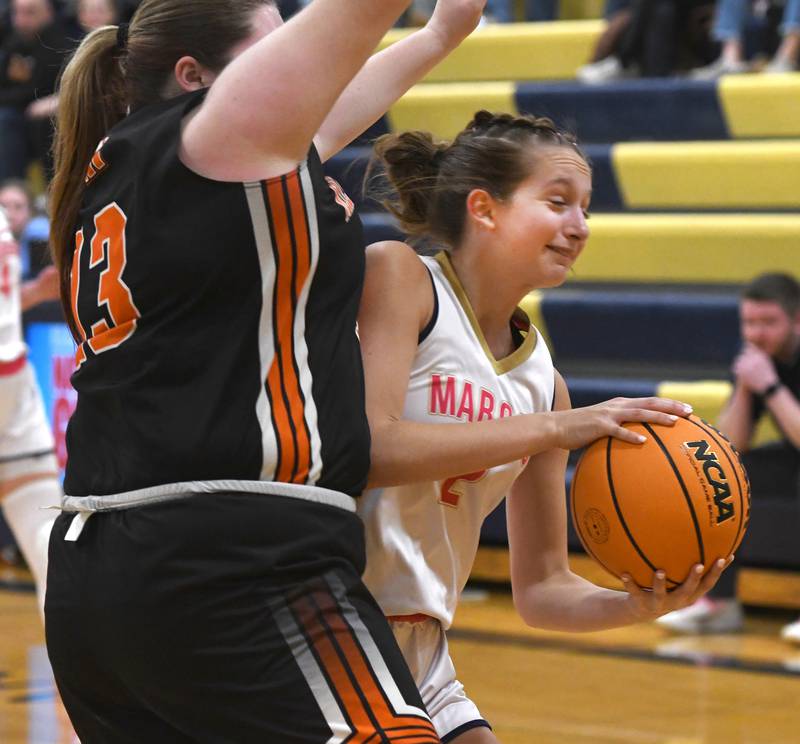 Polo's Laney Mandrell (2) handles the ball as Milledgeville's Olivia Wooden (13) defends on Saturday, Jan. 24, 2026 at Polo High School.