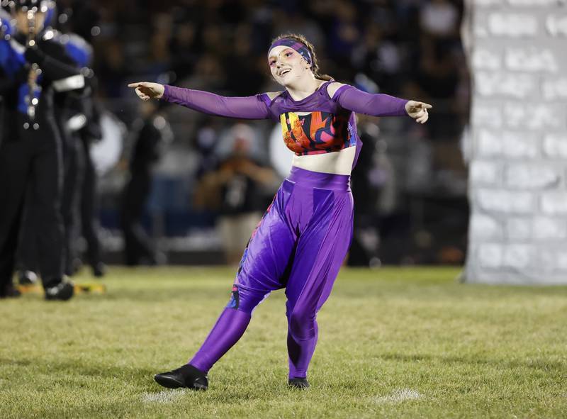 An Oswego East performer dances at halftime during the varsity football game between Plainfield South and Oswego East on Friday, Sep. 20, 2024 in Oswego.