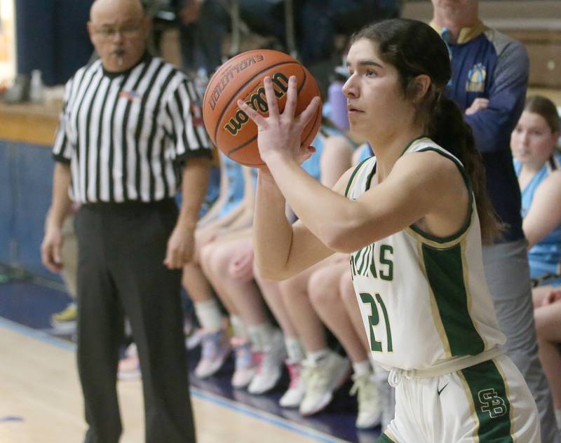 St. Bede's Lily Bosnich shoots a wide-open shot against Marquette during the Class 1A Regional semifinal game on Monday, Feb,. 12, 2024 in Bader Gym.