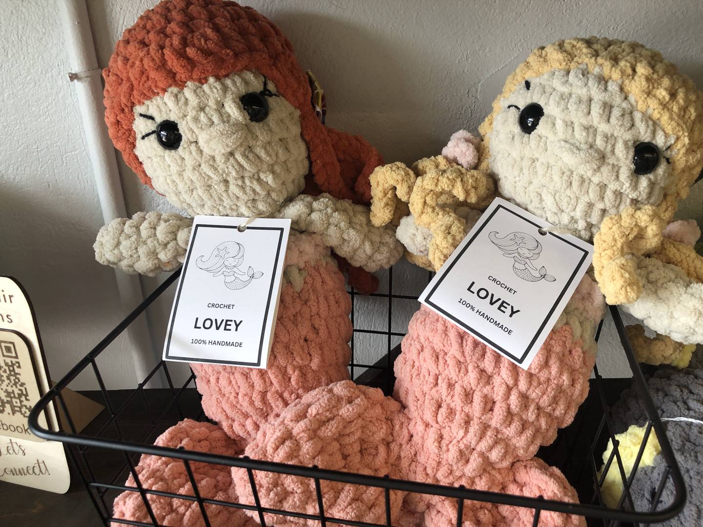 Hand-crocheted dolls and "stuffies" are among the handmade goods sold at the Artisan Marketplace, 1245 N. Green St. Saturday, Aug. 3, marked the store's first year in business.