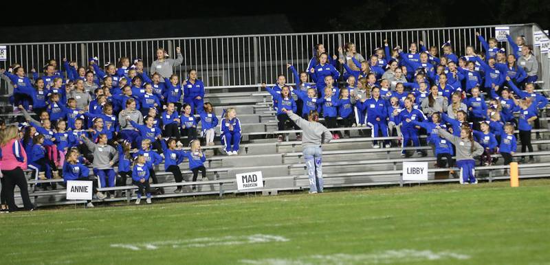 Future Tiger cheerleaders cheer  from the bleachers on Friday, Oct. 10, 2025 at Bryant Field in Princeton.