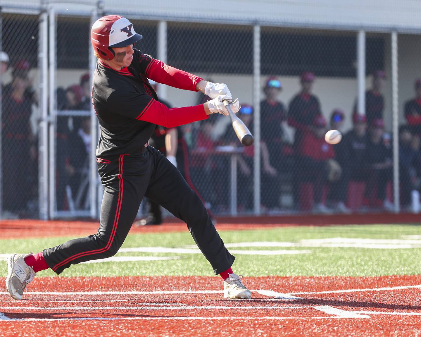 Yorkville's Colin Griffin (21) hits a pitch over the first baseman during baseball game between Oswego at Yorkville. Thursday, May 8, 2025 in Yorkville.