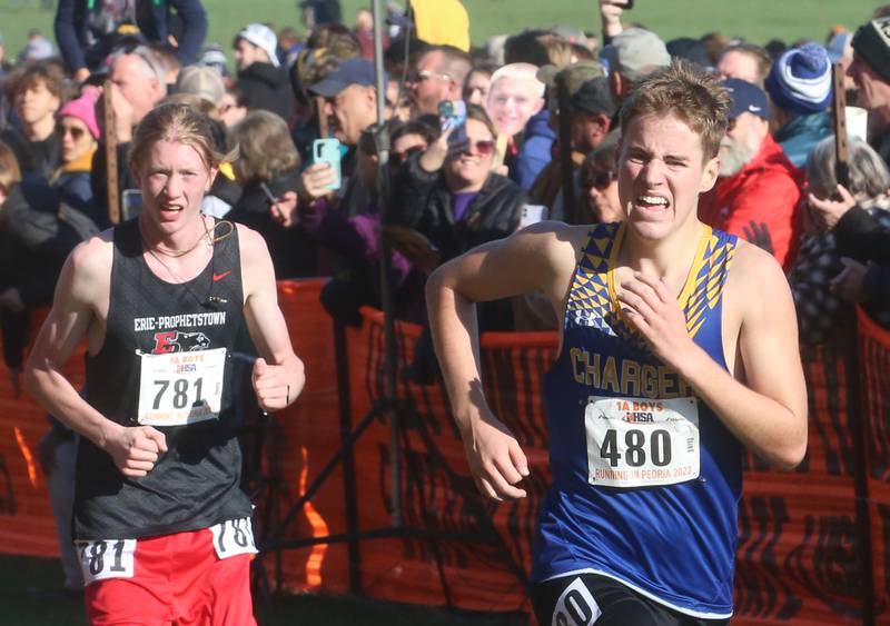 Erie-Prophetstown's Jacob Gibson and Aurora Central Catholic's Kevin Lillwitz compete in the Class 1A State Cross Country race on Saturday, Nov. 4, 2023 at Detweiller Park in Peoria.
