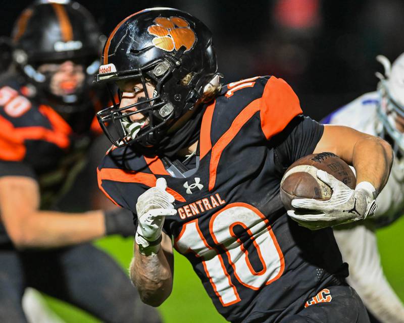 Crystal Lake Central's Griffin Buehler runs with the ball against Fox Valley Conference rival Hampshire on Friday, Oct. 20, 2023 in Crystal Lake.