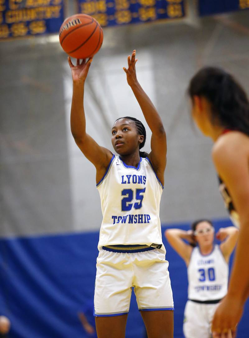 Lyons' Nora Ezike (25) takes a free throw during the girls varsity basketball game between Benet Academy and Lyons Township on Wednesday, Nov. 30, 2022 in LaGrange, IL.