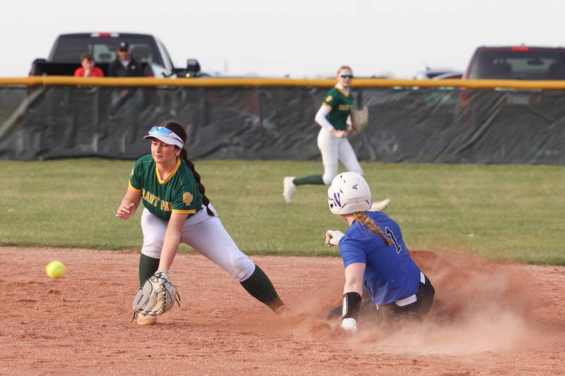 Grant Park's Lola Malkowski fields the throw from the plate as Milford/Cissna Park's Addison Lucht steals second during Grant Park's 12-2 victory in six innings on Wednesday, March 25, 2026.