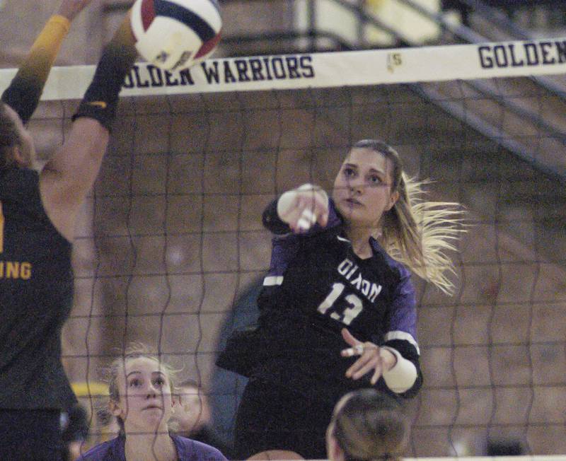 Dixon's Solis Thompson gets the ball past Sterling defenders. Sterling hosted Dixon in Volleyball on August 26, 2025 at Musgrove Fieldhouse.