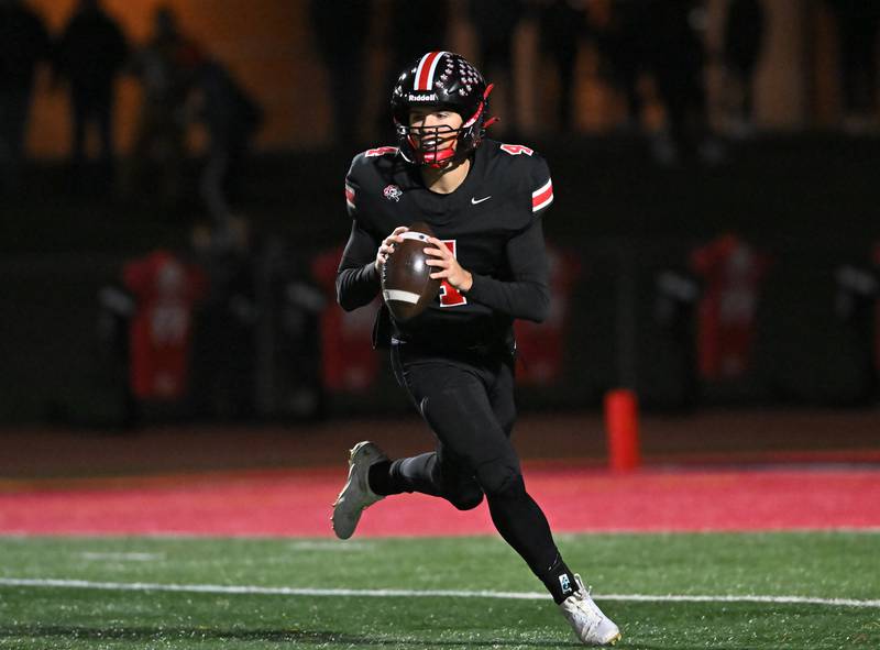 Lincoln-Way Central's Drew Woodburn (4) looks to pass the ball during the Class 7A semifinal playoff game against Batavia on Saturday, Nov 23, 2024 at New Lenox. (Dean Reid for Shaw Local News)
