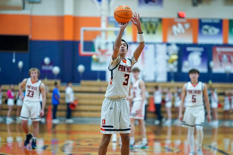Oswego’s Ethan Vahl (3) shoots a free-throw during a basketball game against Oswego East at Oswego High School on Tuesday, February 18, 2025.