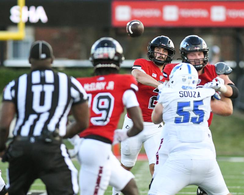 Northern Illinois Huskies quarterback Ethan Hampton (2) completes a pass to teammate Andrew McElroy (19) during the game on Saturday Sept. 21, 2024, while taking on Buffalo at Huskie Stadium in DeKalb.