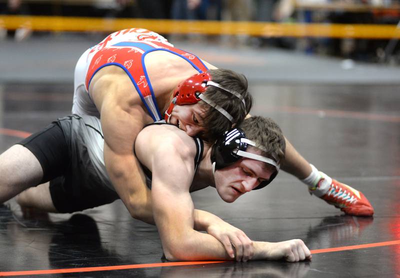 Oregon's Ethan Mowry (top) holds West Carroll's Cole Herrell in the third place match at 157 pounds at the 1A Byron Regional on Saturday, Feb. 8, 2025.