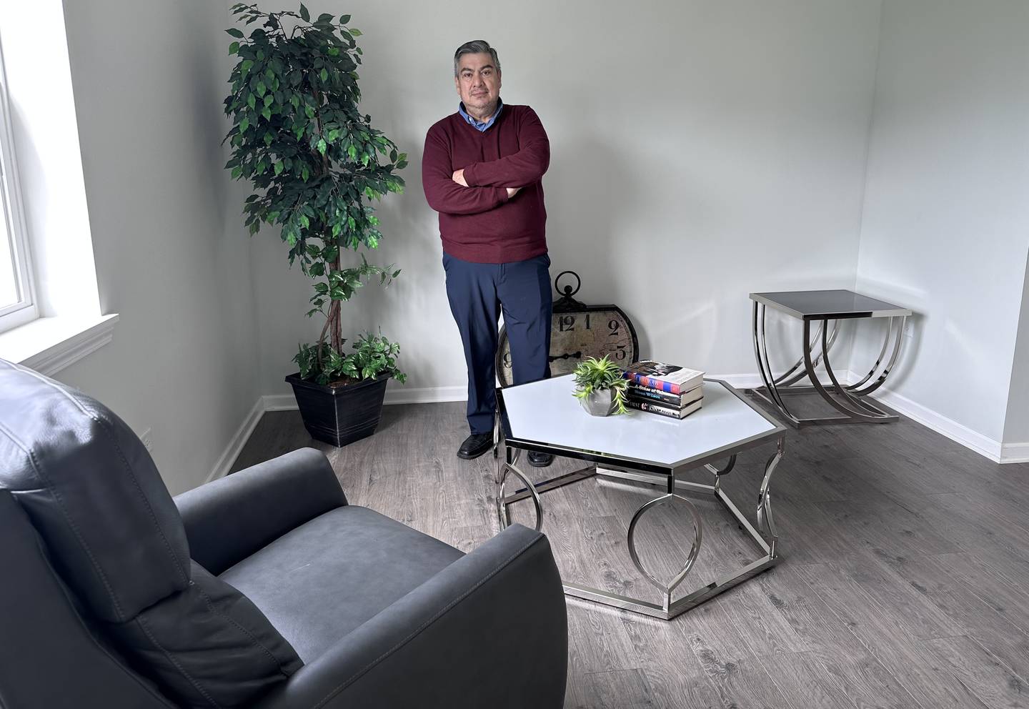 Army veteran Wilson Cerelli poses in what will be his new Habitat for Humanity home in Wonder Lake during a home dedication ceremony on Saturday, May 13.