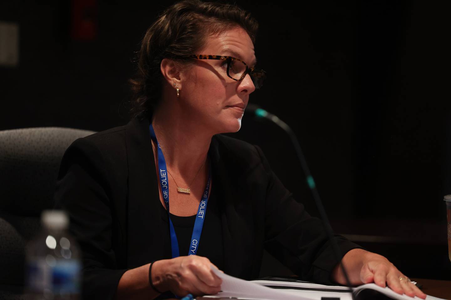 Kristina McNichol, housing specialist with Joliet, sits in on the Joliet City Council meeting on Tuesday. Tuesday, July 19, 2022 in Joliet.