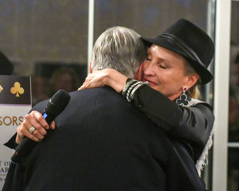 St. Charles Area Chamber of Commerce board Chair Paula Price congratulates Harrison Schneider after he was named Charlemagne Award honoree on Friday, May 1, 2026.