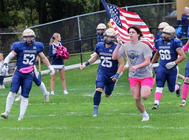 The Marquette Crusaders take the field Saturday as they prepare to take on Knoxville High School Saturday at Marquette.