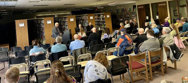 Jeremy Aitken moderator and mayoral candidates Doug Bernabei and mayor Ken Kowlosk hold a candidate forum on Sunday, Feb. 23, 2025 at the Peru Public Library.