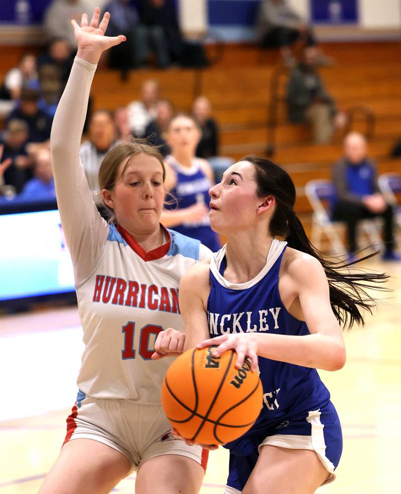 Hinckley-Big Rock's Mia Cotton goes to the basket against Marian Central's Kaitlyn Kowalsky Monday, Feb. 16, 2026, during their regional semifinal game at Hinckley-Big Rock High School.