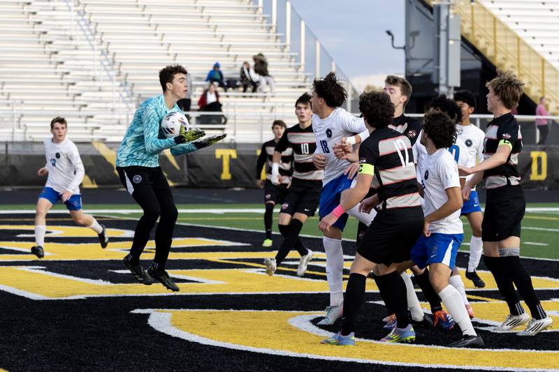 Lincoln-Way East's Shane Kerley makes a nice save during the 3A Joliet West Sectional boys varsity soccer match against Lincoln-Way Central at Joliet West on Oct. 29, 2025.