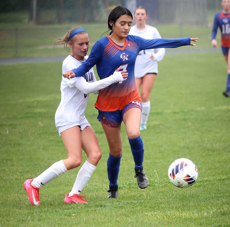 Genoa-Kingston's Jaida Modesto (right) and Rockford Christian's Paige Giardina chase after the ball Tuesday, May 20, 2025, during their Class 2A regional final game at Rockford Christian High School.