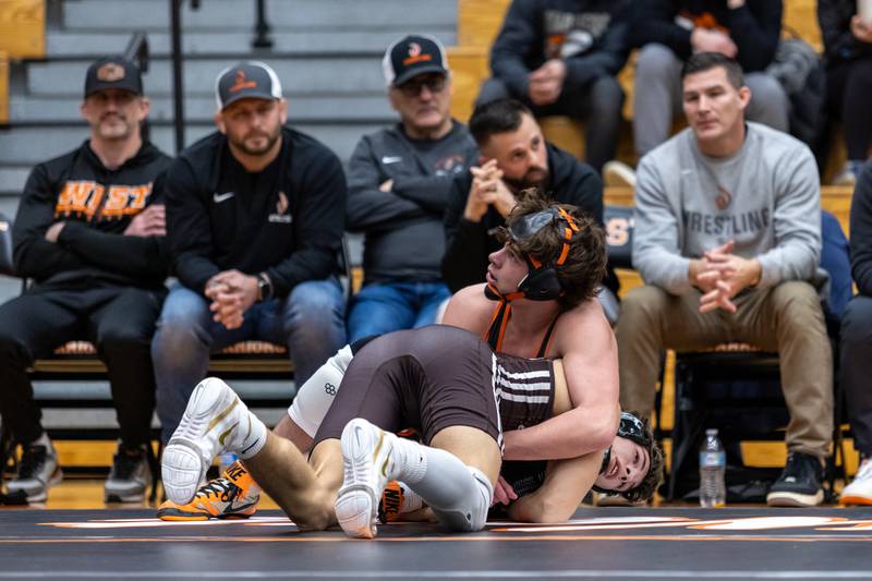 Lincoln-Way West’s Max Herman and Joliet Catholic’s Nolan Vogel compete in the 165 pound match at Lincoln-Way West on Jan. 8, 2026.