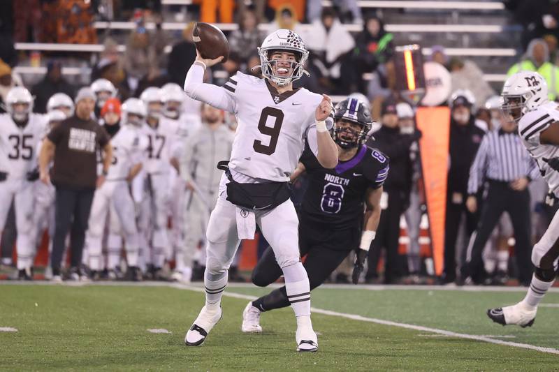 Mt. Carmel’s Jack Elliott passes against Downers Grove North in the Class 7A championship on Saturday, Nov. 25, 2023 at Hancock Stadium in Normal.