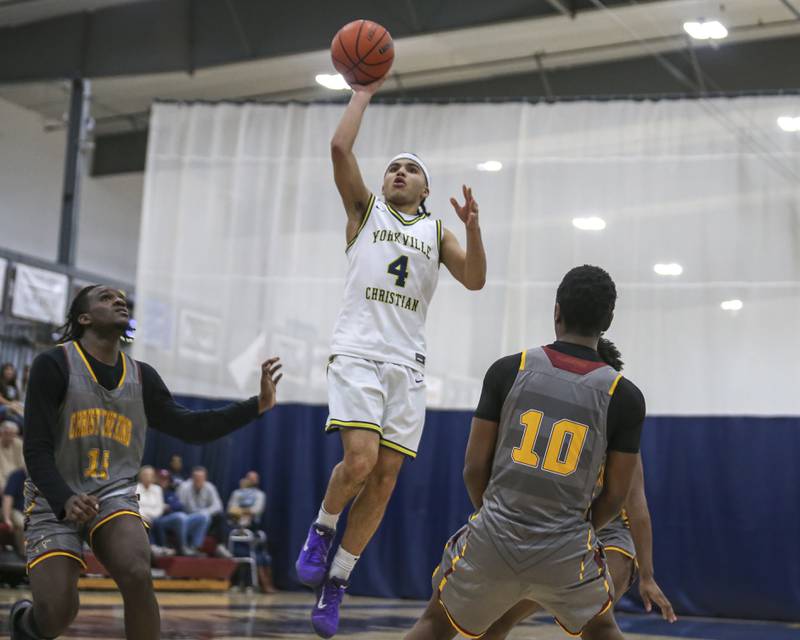 Yorkville Christian's Tray Alford (4) puts up a shot down the stretch during their basketball game between Christ the King at Yorkville Christian, Feb 6, 2026 in Yorkville.