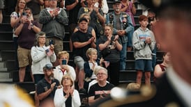 McHenry High, community welcome home Honor Flight participants 