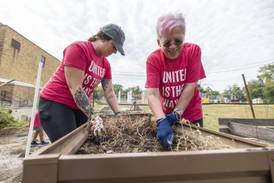 United Way volunteers lend a hand during Day of Caring in Lee, Ogle counties