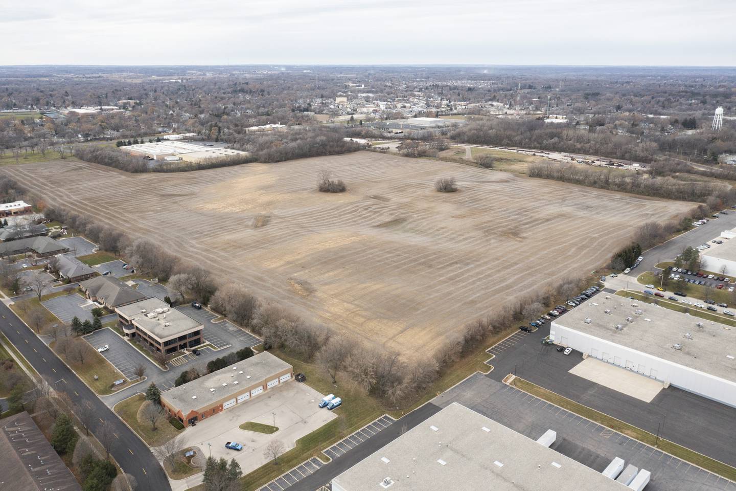 The undeveloped land north of Congress Parkway and east of South Main Street in Crystal Lake photographed on Saturday, December 4, 2021, is the site of a potential Amazon warehouse