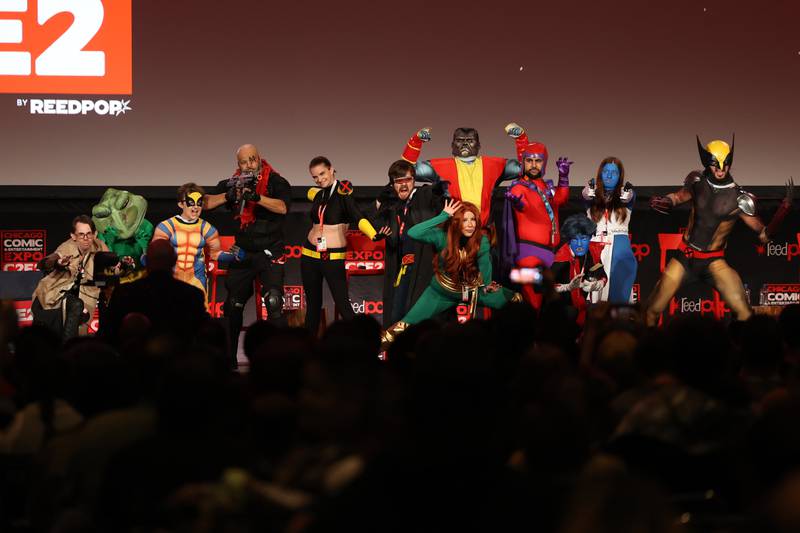 X-Men fans poses on stage before the X-Men: The Animated Series cast reunion panel at C2E2 Chicago Comic & Entertainment Expo on Friday, March 31, 2023 at McCormick Place in Chicago.