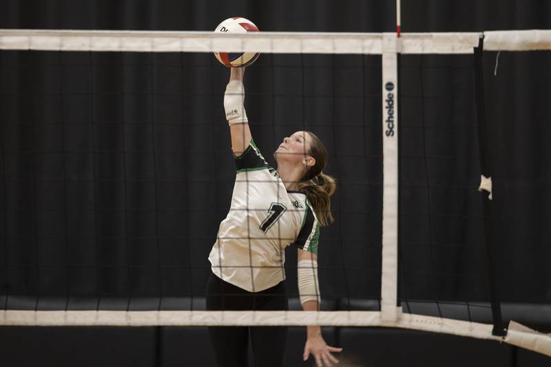 Rock Falls’ Kacie Witherow plays the ball over the net against Dixon Thursday, Sept. 19, 2024, in a Big Northern Conference match at RFHS.
