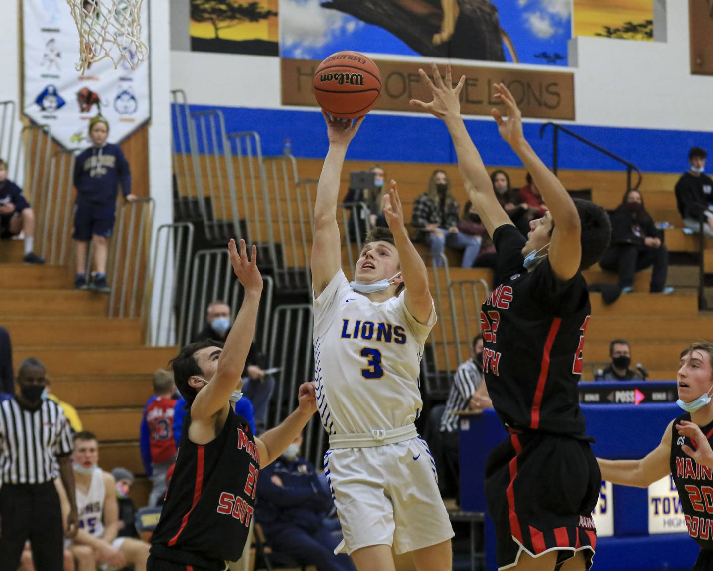 Lyon's Jackson Niego (3) puts up a shot during basketball game between Maine South at Lyons. Nov 23.