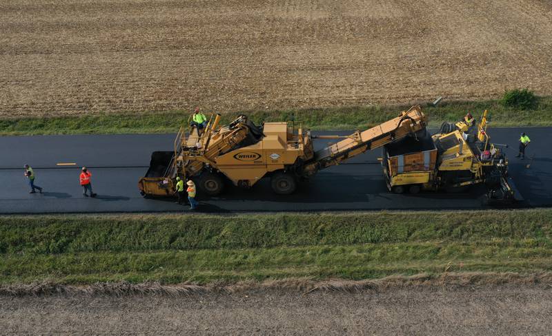 Crews resurface Illinois Route 251 on Friday, Oct. 17, 2025 near the intersection of North 39th Road just south of Mendota. Resurfacing work consists of patching and resurfacing, which is expected to be completed in mid-November. The work zone stretches from the BNSF railroad bridge south of Mendota to just north of Interstate 80 in Peru. The construction will continue into the spring with earth work. Motorists are asked to drive with caution through the construction zone. The Route 251 work between Mendota and Peru will lead to daily lane closures controlled by flaggers.