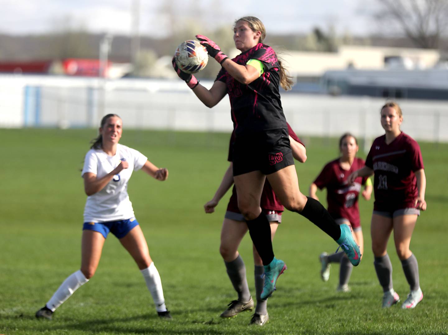 Marengo’s Macy Noe grabs a the ball out of the air during a Kishwaukee River Conference soccer match against Johnsburg on Wednesday, April 15, 2026, at Marengo High School.