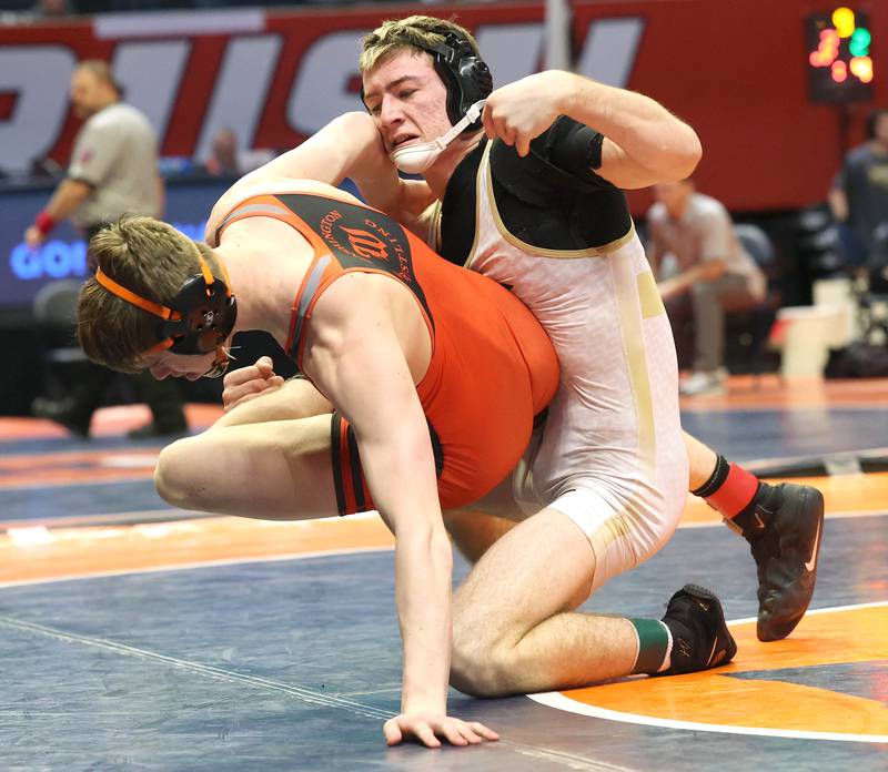 Sycamore’s Zack Crawford gets control of Washington’s Zane Hulet in the Class 2A 160 pound 3rd place match Saturday, Feb. 18, 2023, in the IHSA individual state wrestling finals in the State Farm Center at the University of Illinois in Champaign.