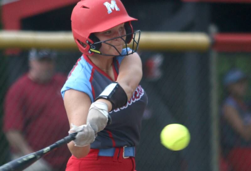 Marian Central’s Holly Garrelts connects for an RBI single as the Hurricanes faced Winnebago to begin an IHSA Class 2A Regional game at Raymond Benoy Field in Woodstock Monday.