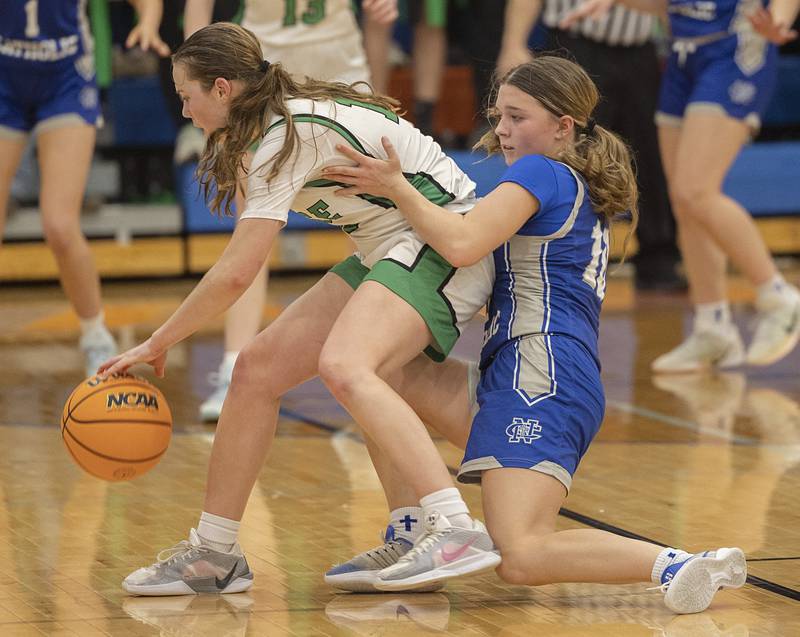 Wethersfield’s Camryn Anderson is fouled by Newman’s Elaina Allen Thursday, Feb. 26, 2026, in the Class 1A sectional semifinal at Eastland.