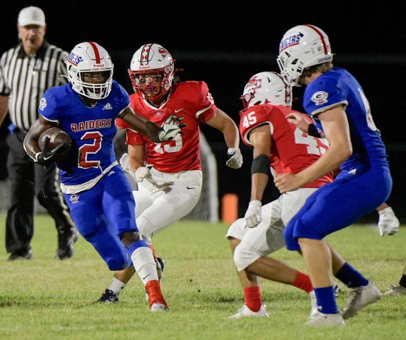 Glenbard South's Trevor Burnett (2) carries the ball against South Elgin during a game in South Elgin on Friday, September 10, 2021.