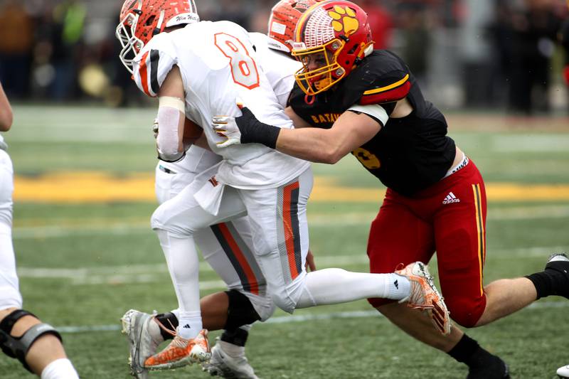 Batavia’s Jack Sadowsky (6) takes down Hersey’s Carson Grove during their Class 7A second-round playoff game in Batavia on Saturday, Nov. 5, 2022.