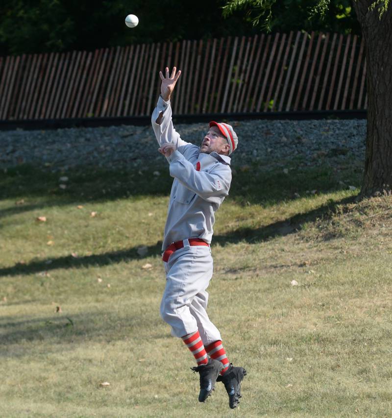 Oregon Ganymede right fielder Eric Berg jumps up to snag a line drive against the Columbus Buckeyes at the World Tournament of Historic Base Ball held at the Henry Ford Museum's Greenfield Village on Saturday, Aug. 9, 2025.