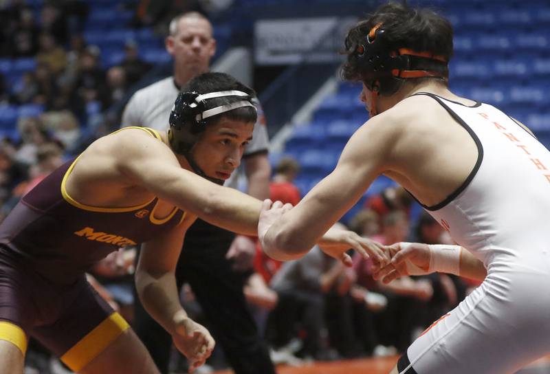 Montini's Josh Vazquez sizes up Washington’s Eli Gonzalez during the 126-pound match In the IHSA Class 1or2A Dual Team Sate Championship match Saturday, Feb. 24, 2024 at Grossinger Motors Arena in Bloomington.