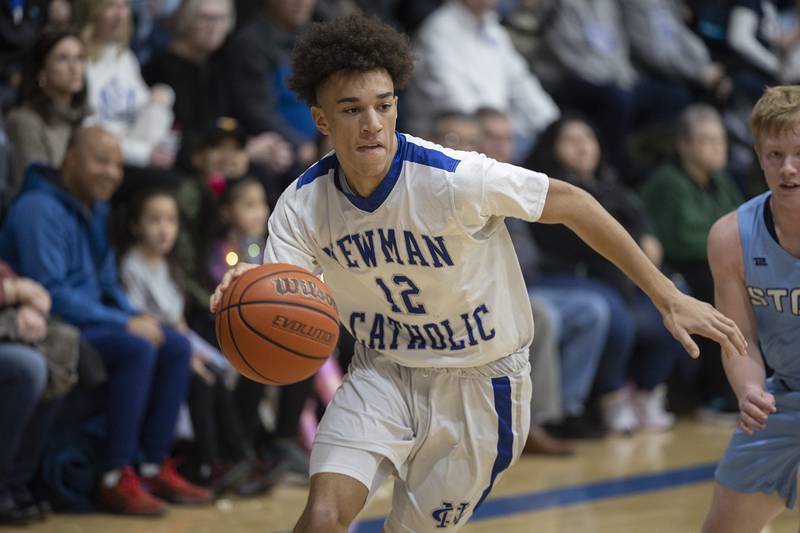 Newman’s Isaiah Williams drives to the hoop against Bureau Valley Friday, Jan. 26, 2024 at Newman High School.