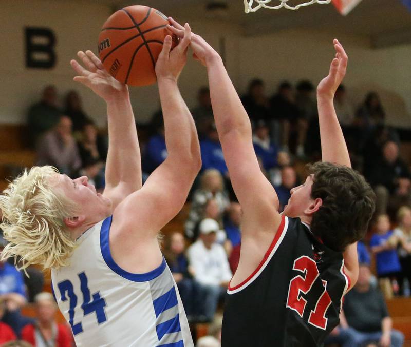 Princeton's Daniel Sousa grabs a rebound over Hall's Jack Jablonski on Friday, Jan. 26, 2024 at Princeton High School.